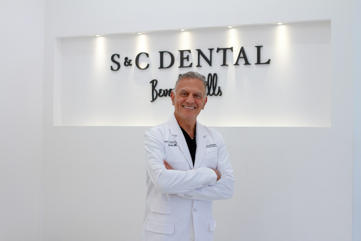 Dr. Kourosh Maddahi, DDS, in his Beverly Hills dental office
